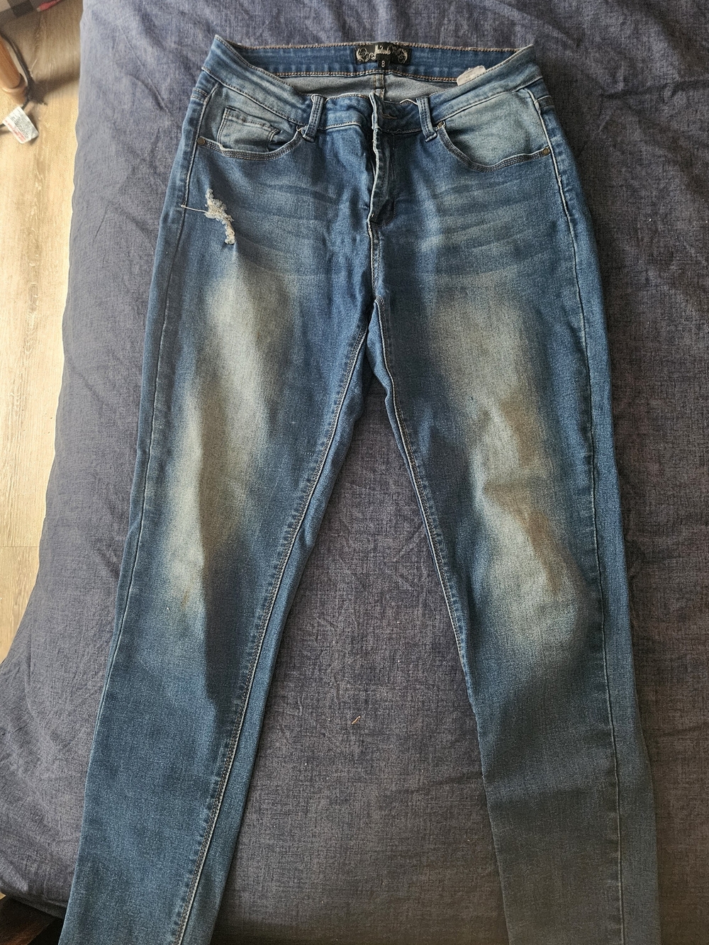 Women’s Blue Distressed Slim Jeans